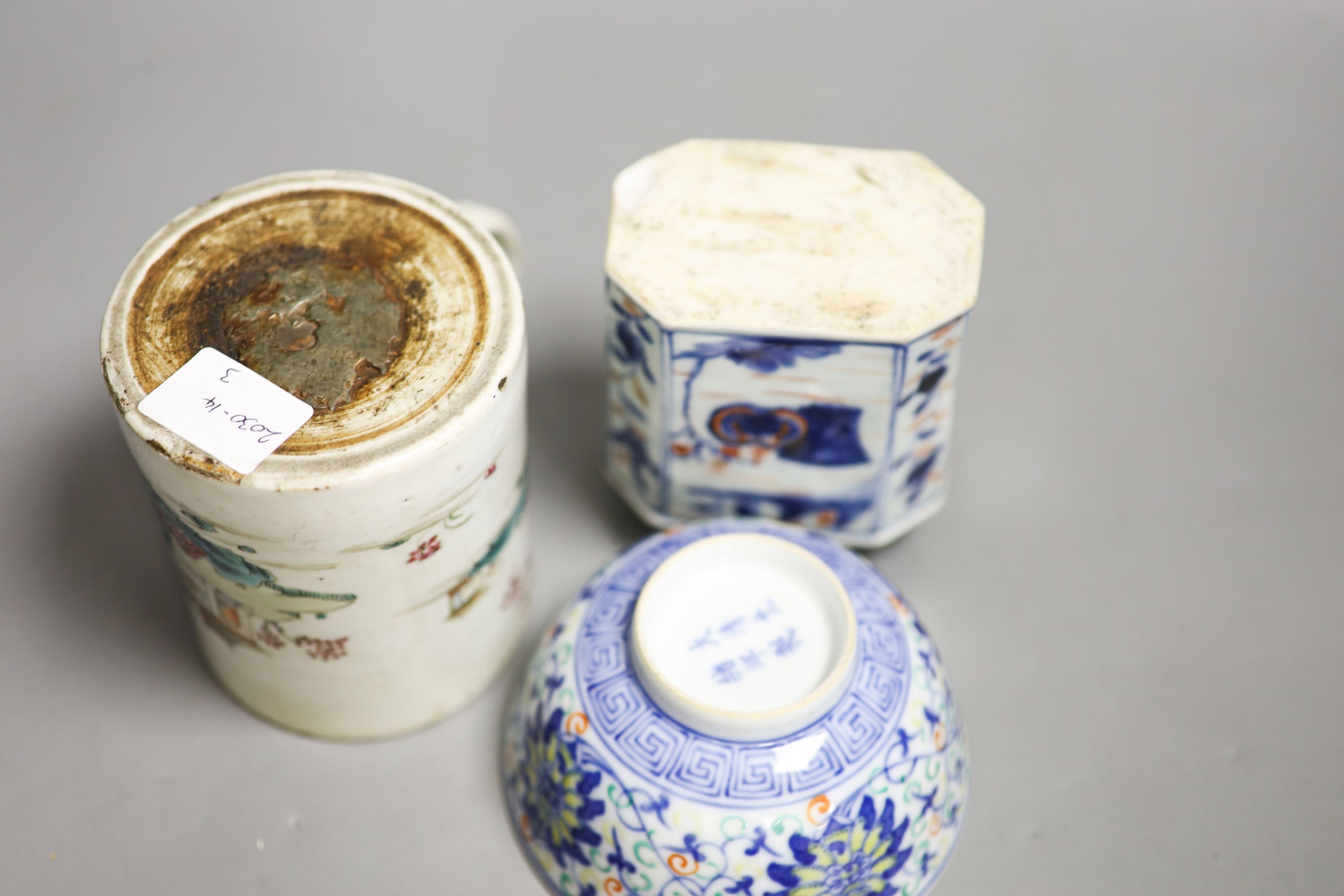 A Chinese famille rose mug, a Chinese Imari tea caddy and a doucai bowl, 18th century and later